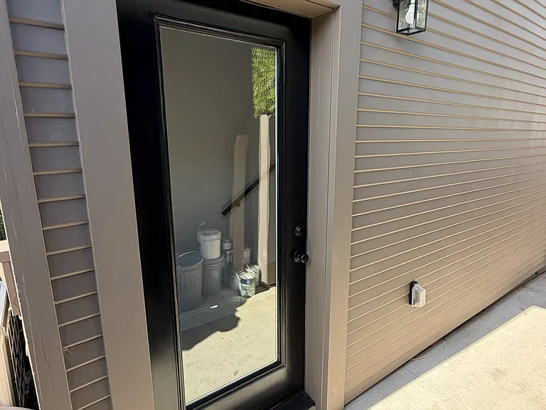 Private front door, brand new steel door, double pained security glass doul dead-bolt and keyed locks.