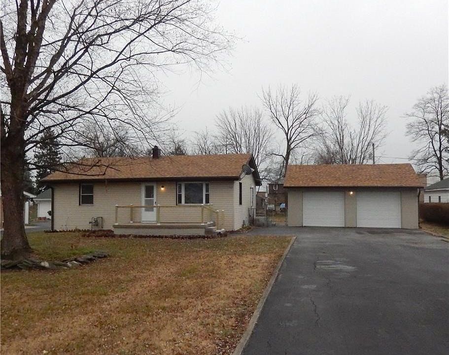 Nicely remodeled inside and out... Real nice mature tree in front yard