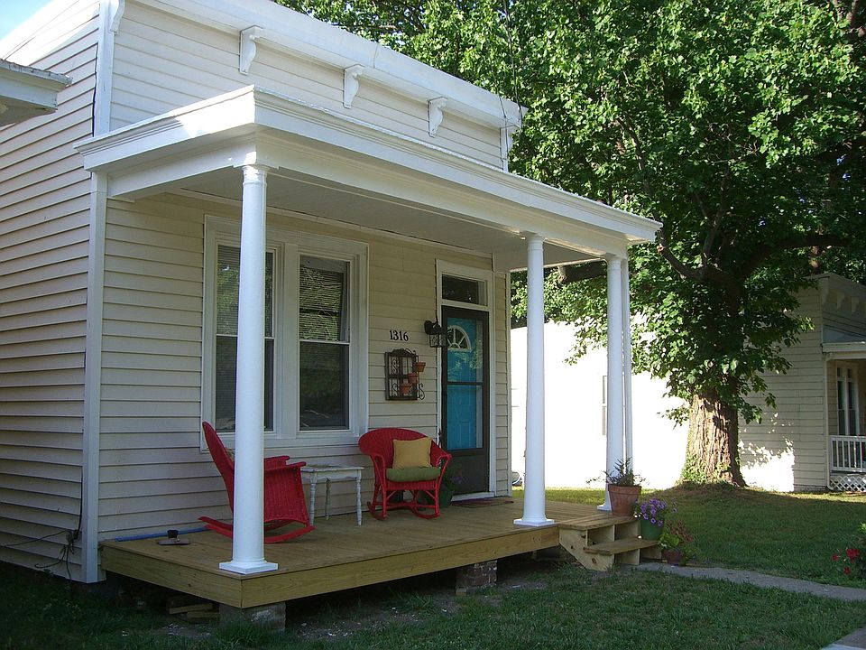 Front of house featuring the new porch