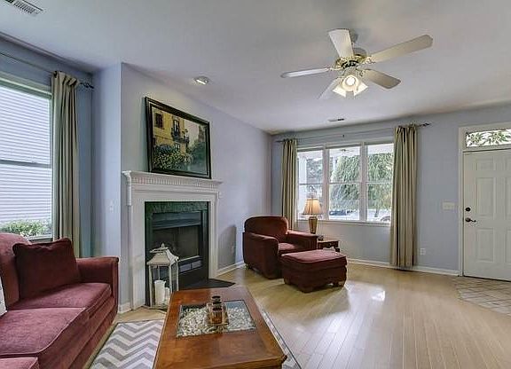 Large living room with lots of natural light