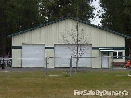 50x40 pole shop w/ 2 doors
						:
						drway bk to shop, lg space for turning ard a RV or all big boy toys.