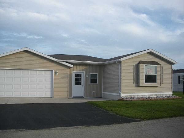 2 car attached garage & Bree