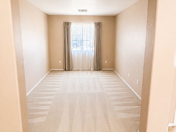 Bright extended living space perfect for a formal sitting area, playroom, or home office.
