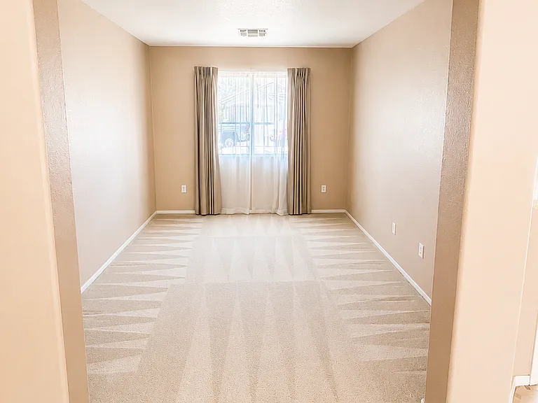 Bright extended living space perfect for a formal sitting area, playroom, or home office.
