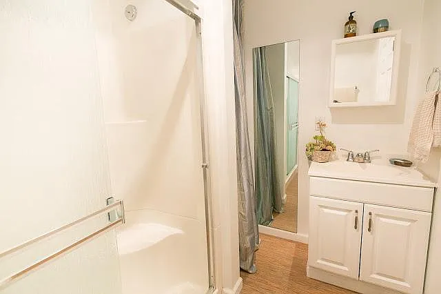 Bathroom off of the entertainment office room.