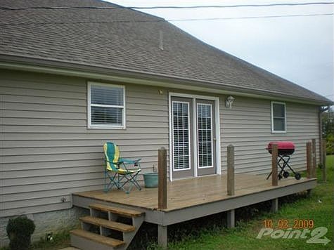 Enjoy entertaining your family and friends on your deck. French doors leading into kitchen/eating ar
