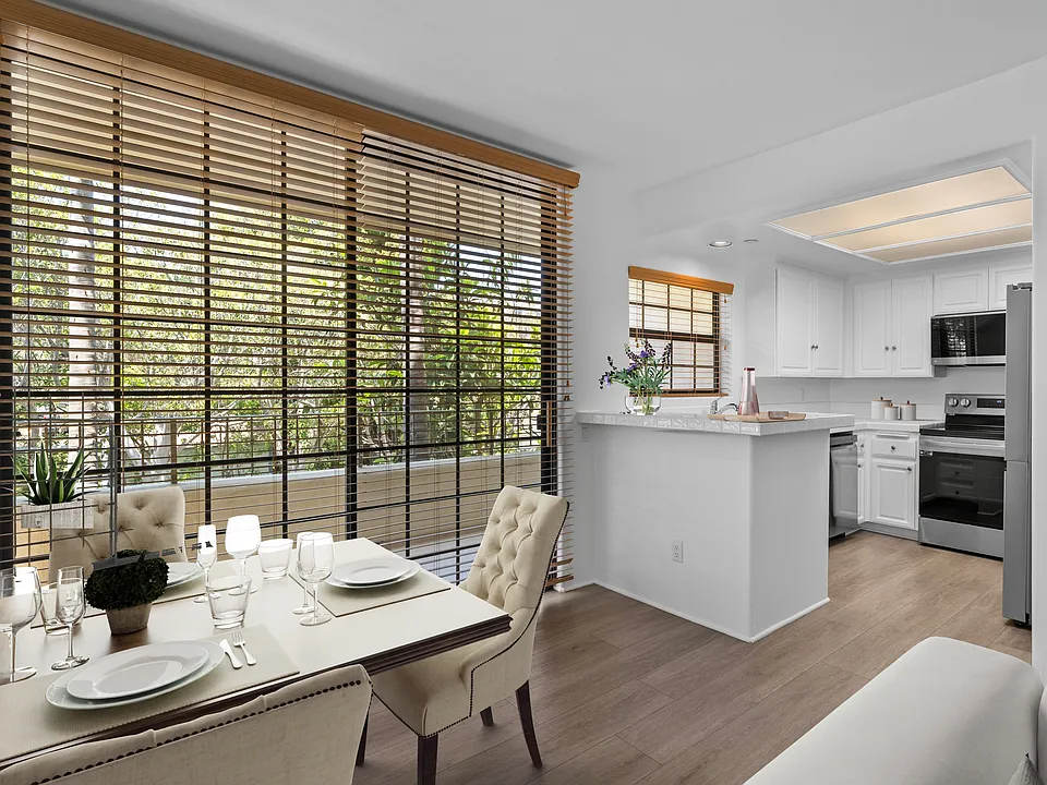 Kitchen leads to balcony. Floorplan A