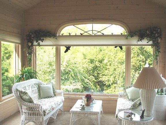 Sun room overlooking the beautiful gardens