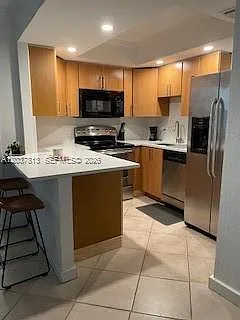 1050 SE 15th St #202 — Photo 11