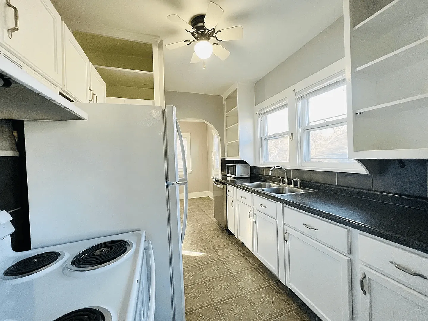 Inviting Home Filled With Natural Light and Historic Charm — Photo 2