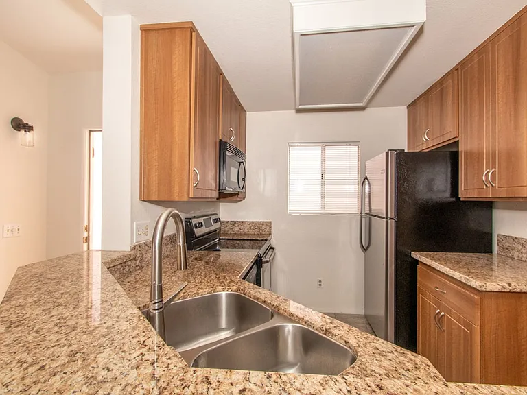 7087 Camino Revueltos #306 — Photo 5