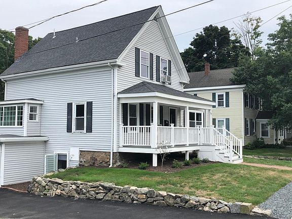 Featuring a spacious lawn and natural stone walls as well as dedicated off-street parking.