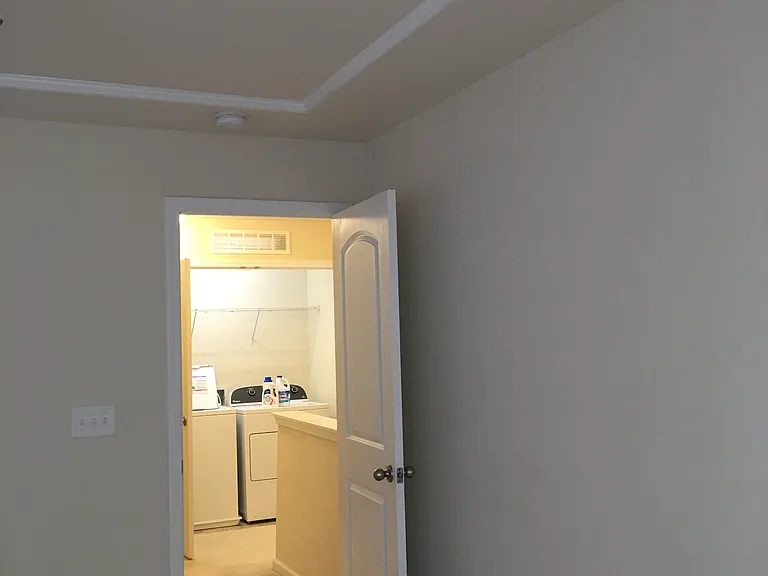 Entrance to Master Bedroom w/ Cauferred ceilings| view from hallway and laundry. Bedroom #2 is on opposite end for privacy