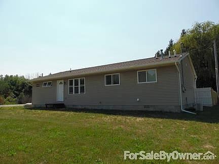 Roadside View - M30
						:
						Small porch and large front yard.