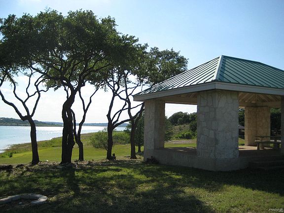 Matching 700 SF Pavilion on the water for a bunch of fun!