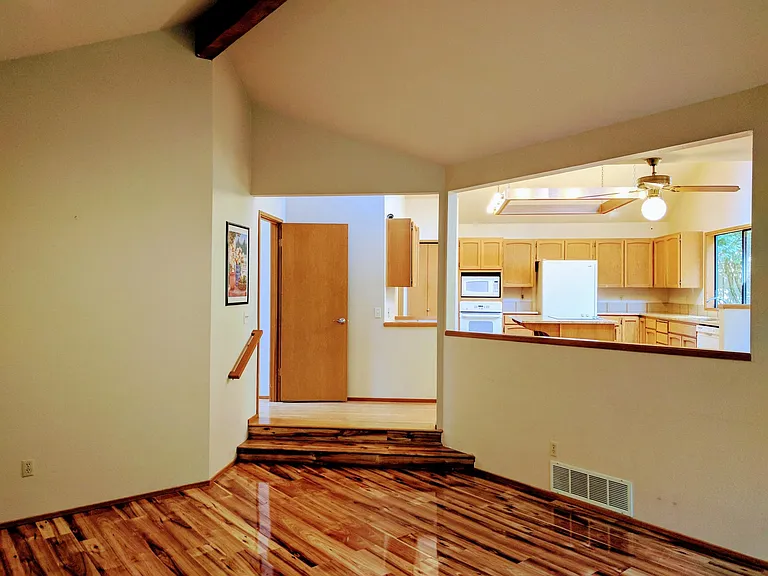 The family room opens up to the kitchen.