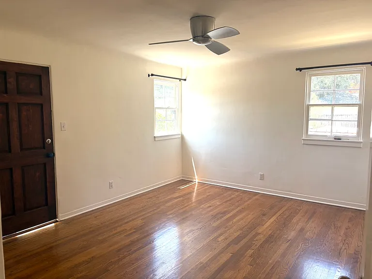 Bedroom #4 with door to balcony.