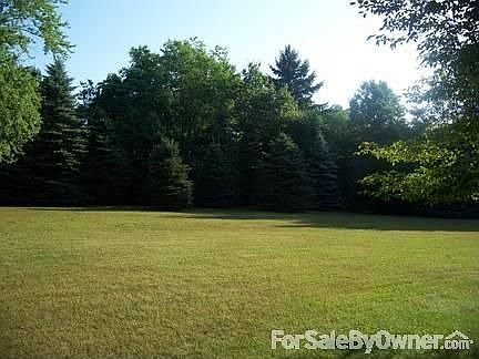 View of back of house and garage