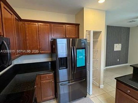5th image of 11668 NW 88th Ln #Townhouse 11668