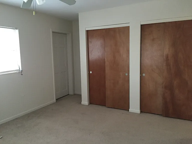 Bedroom w/ Dual Closets