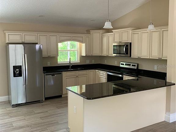 4th image of 9535 N Pineview Way
