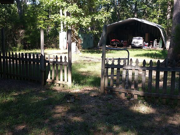 huge carport and shed