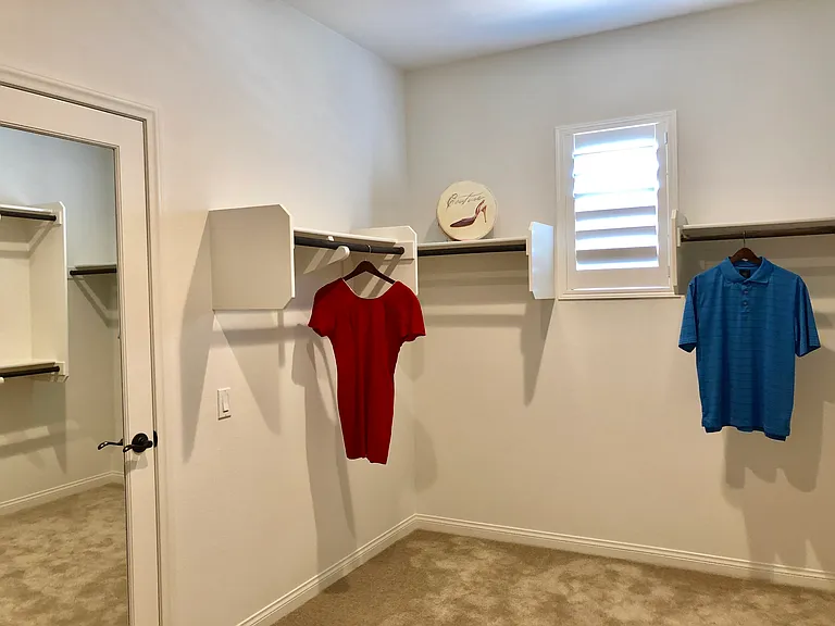 large walk in walk-in closet in primary bedroom