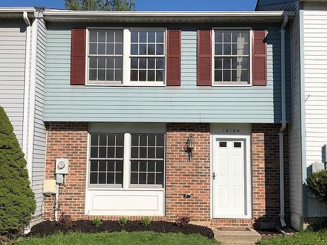 Front of the house with newer landscape.