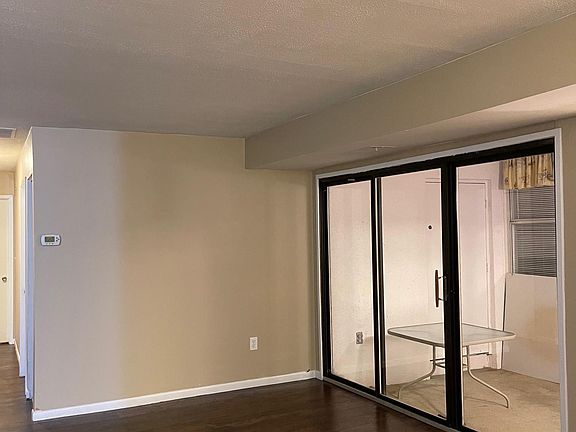 Living room with view of the sunroom