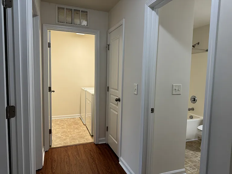 View from hallway to laundry room and bathroom #2