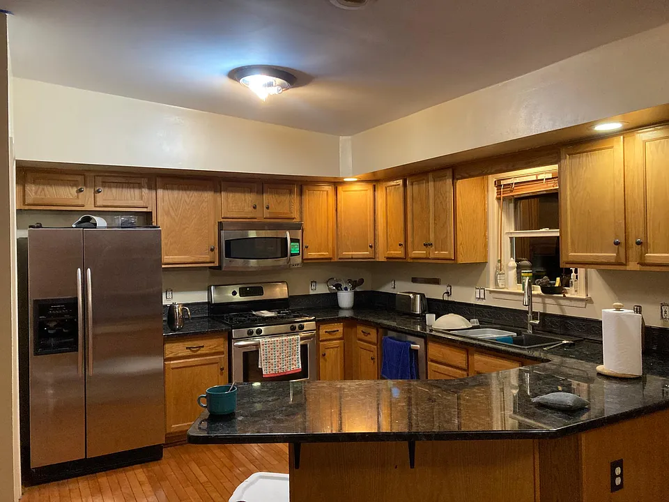 Modern spacious kitchen with gas stove 2 sinks