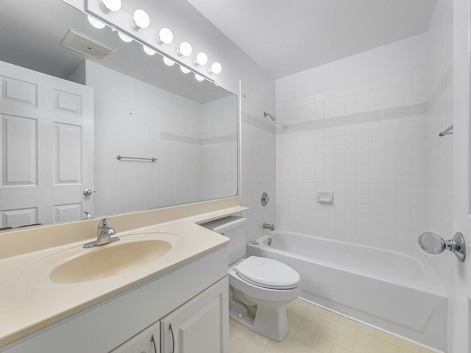 Guest Bathroom - washer and dryer are behind door.