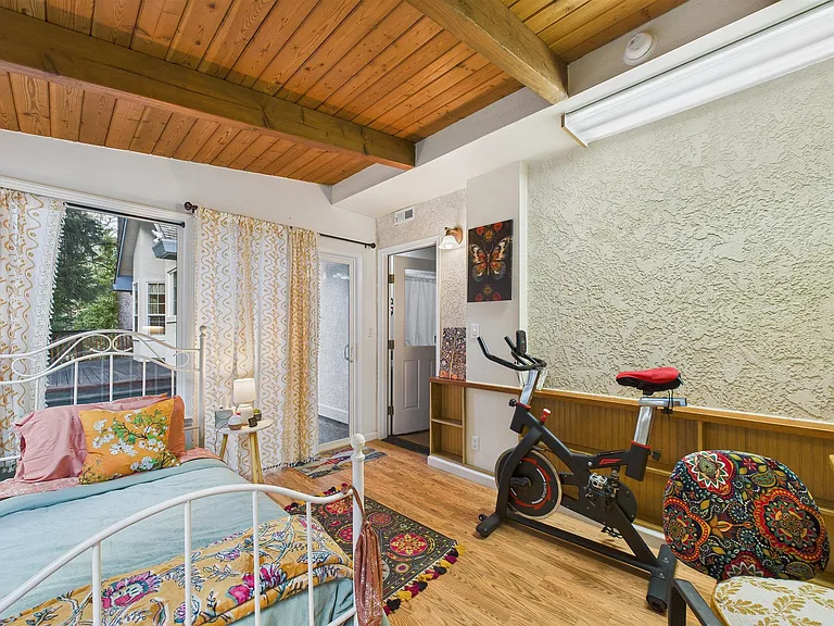 +Sunroom/office
+Exterior Access
+Desk with monitor/printer
+Workout bike + yoga equipment
+Door locks
