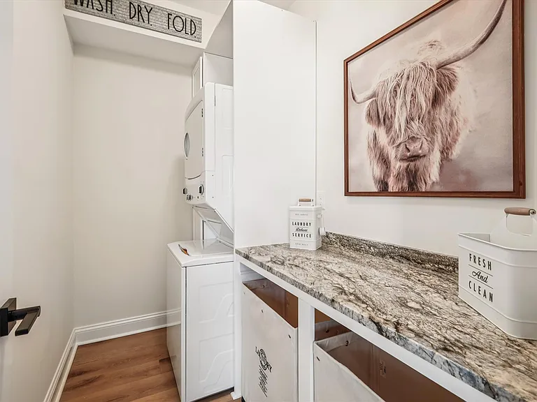 Separate Laundry Room with Granite Countertops