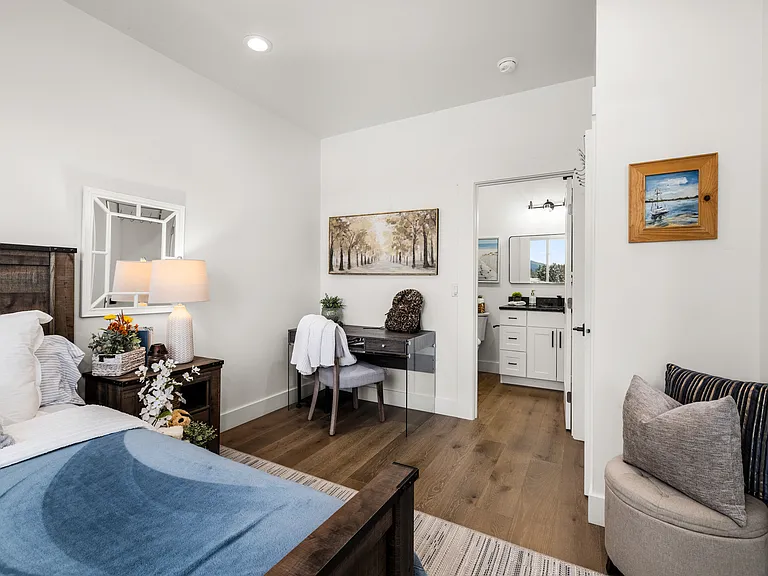 Bright and welcoming bedroom suite with space for a study desk or creative corner, along with its own en-suite bath, perfect for kids, guests, or additional family living.