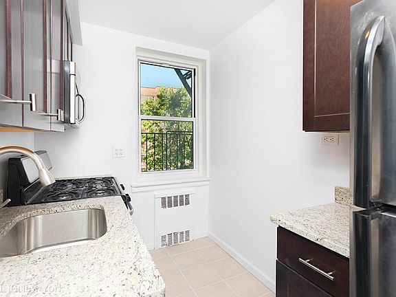 2nd image of 5572 Netherland Ave APT 2G