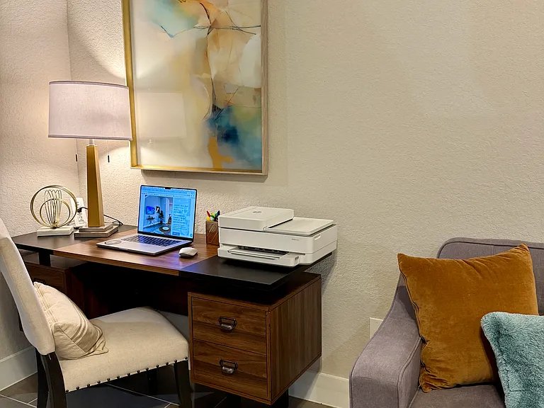 Dedicated Work Desk located on the main floor is open for anyone in the home to use. Wi-FI is included.

*Printer and laptop shown for photo purposes only