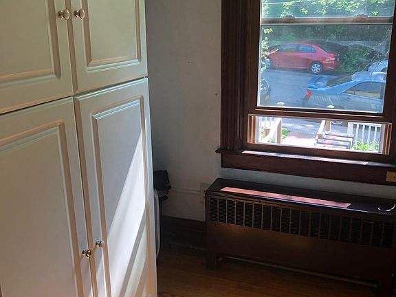 Bedroom 1, wardrobe and East window