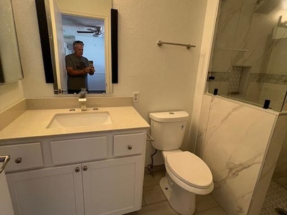 Master bath features, marble vanity and new marble walk in shower!