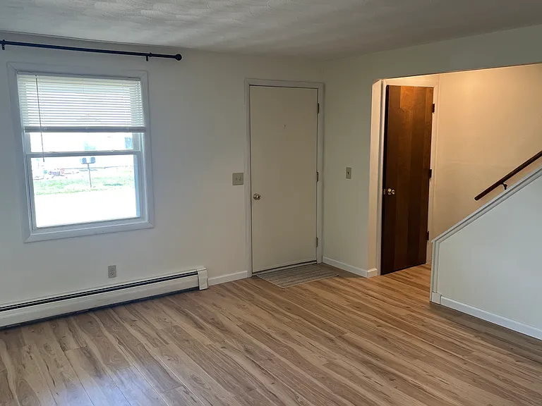 Living Room & Coat Closet