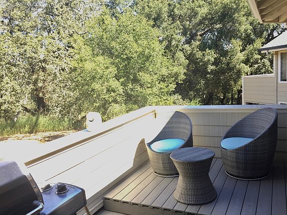 Relax on your quiet private balcony with greenbelt!