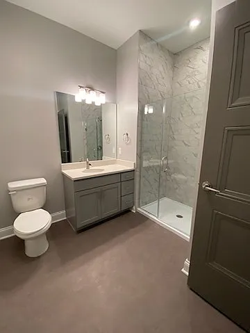 Hartman- Spacious Bathroom With Stand Up Shower and Floor To Ceiling Shower Tiling. Brushed Nickel Finished Throughout. Hartman- Spacious Bathroom With Stand Up Shower and Floor To Ceiling Shower Tiling. Brushed Nickel Finished Throughout.
