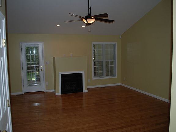 Living room - hardwood floors, gas fireplace, vaulted ceilings!
