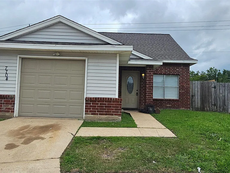 7704 Sign St — Photo 1