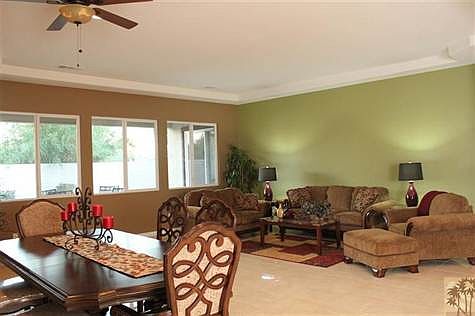 Living and Dining is open and bright with natural light.