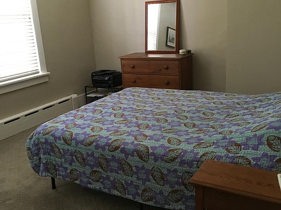 Sunny front bedroom with closet