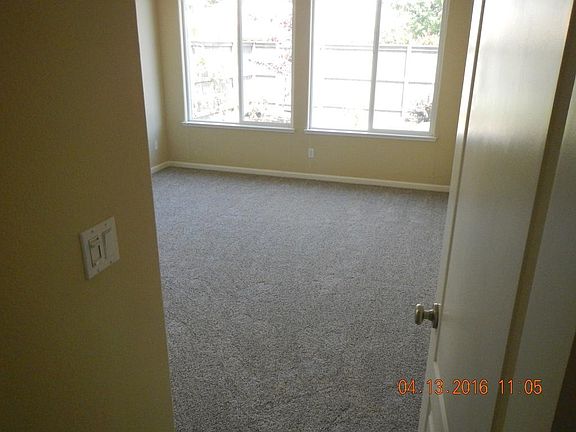 Master bedroom. Looks to back yard