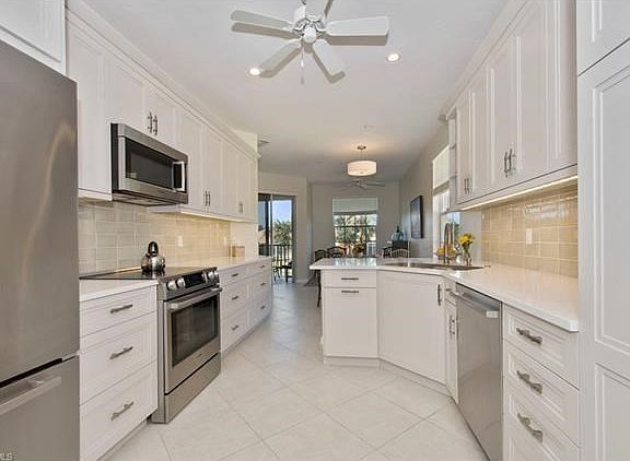 Kitchen with close up view of the premium cabinets and appliances