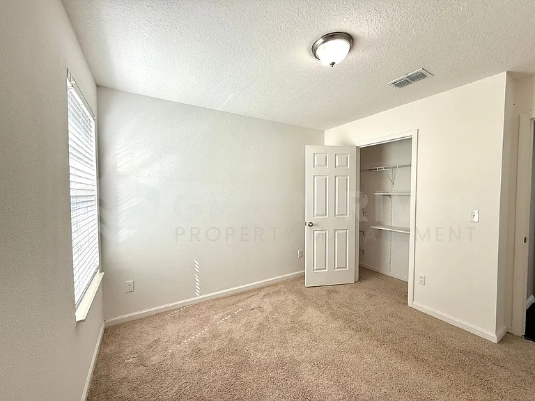 8704 Lake George Cir W — Photo 24