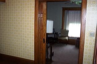 Pocket door from foyer to living room.